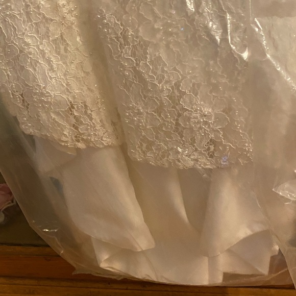 David's bridal gown worn once been cleaned. - Picture 12 of 14